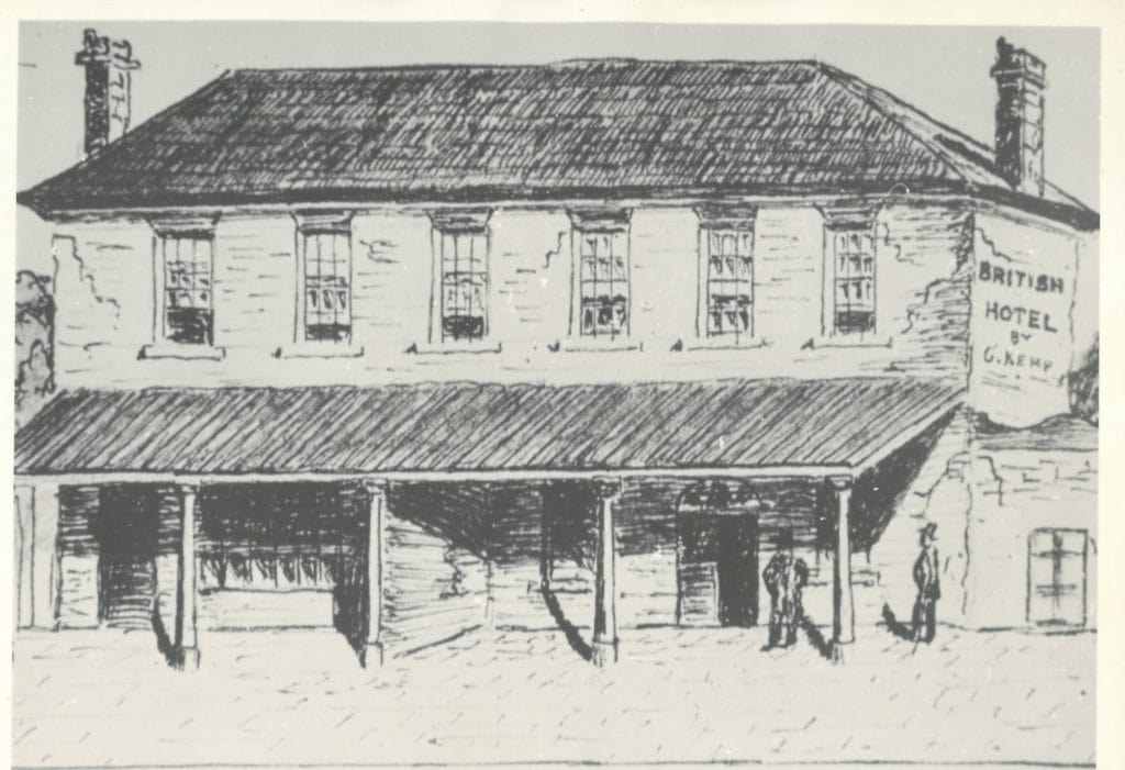 A sketch of a 2-story hotel, as seen from the front. Text on the side of the building reads: "British hotel by G. Kemp.