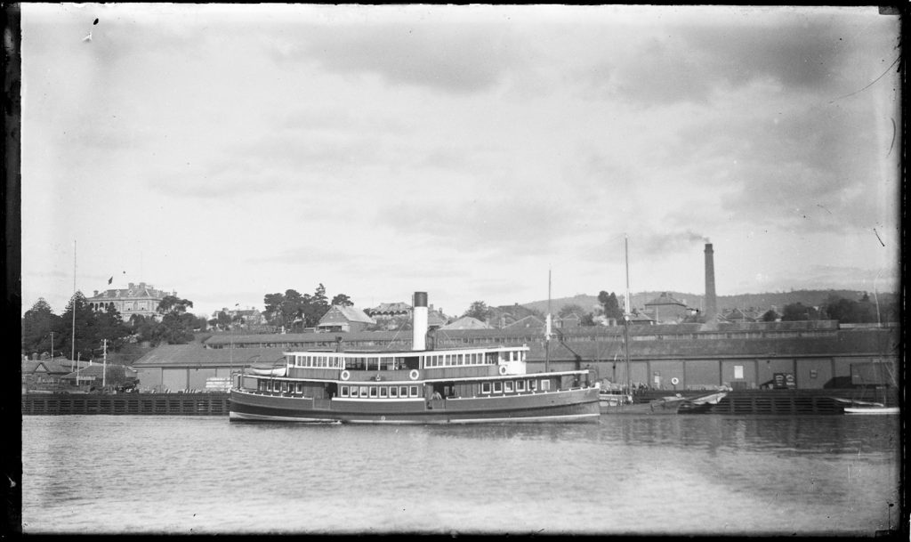 An old black and white photo of the Rosny ferry in front of Princess Pier, Hobart.