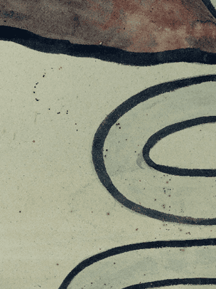 A close up of the damage to the drawing, spots on the paper