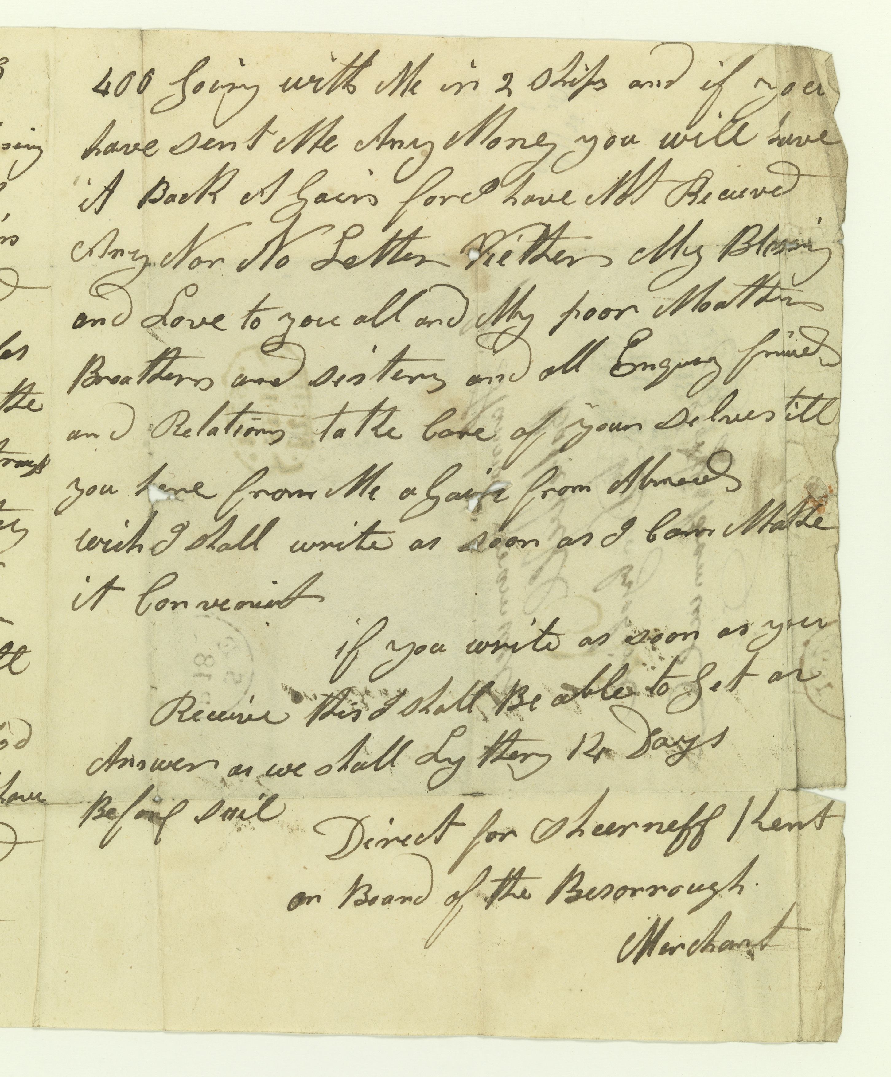 An old piece of paper with cursive text on it. Text illegible.