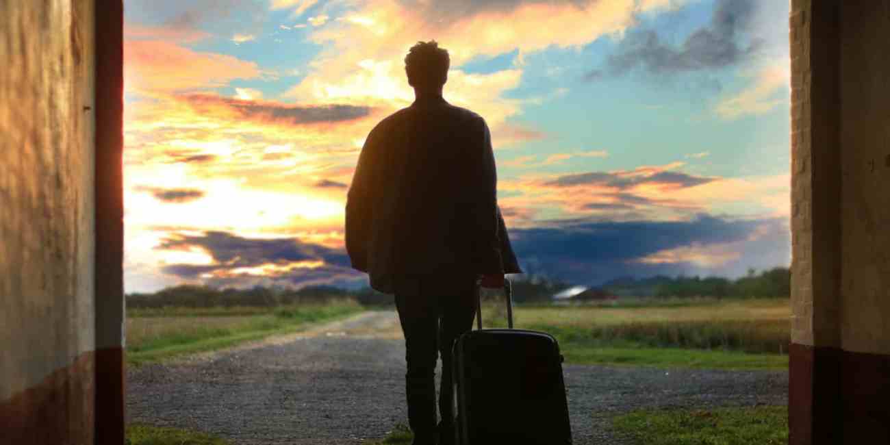 global visa requirements-man holding luggage photo