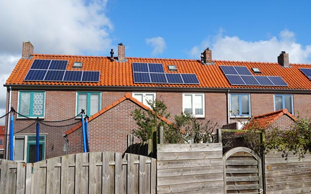Solar panels on top of terraced houses.