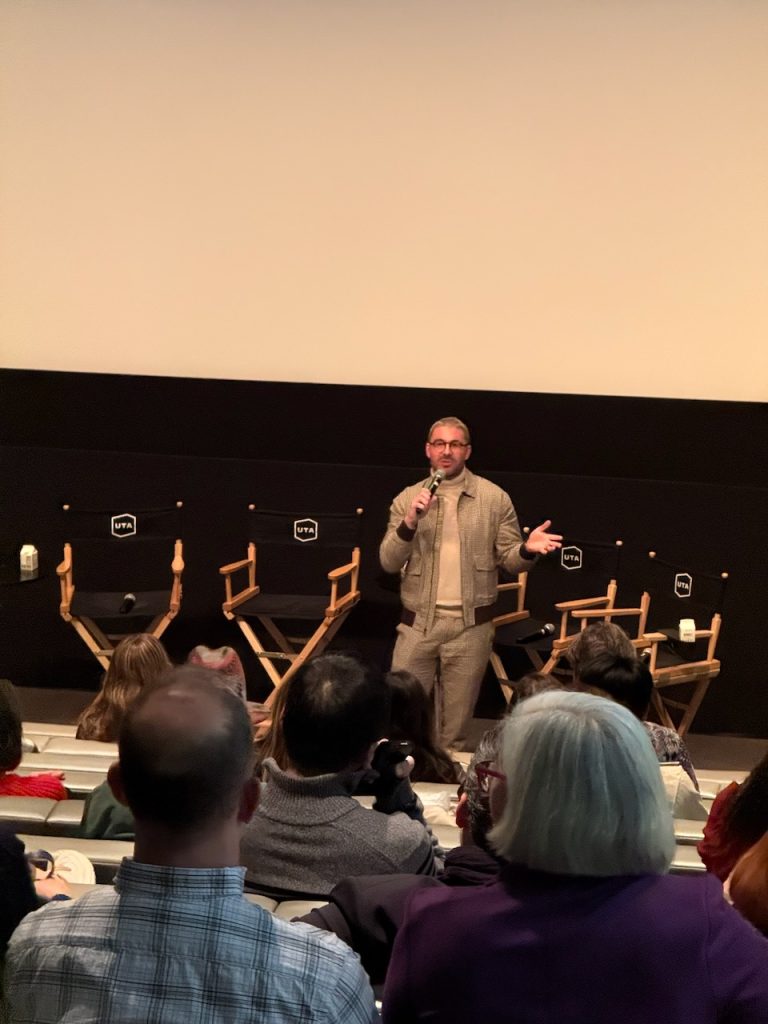 James Kicklighter addresses audience from stage at The American Question screening panel in Beverly Hills theater