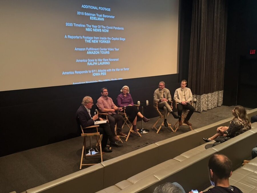 Six panelists seated on stage at The American Question screening in Beverly Hills, December 2024 with James Kicklighter