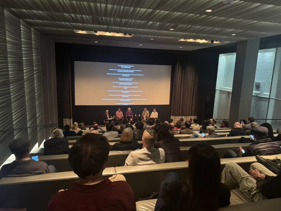 Audience watching a panel discussion during The American Question screening at UTA in Beverly Hills