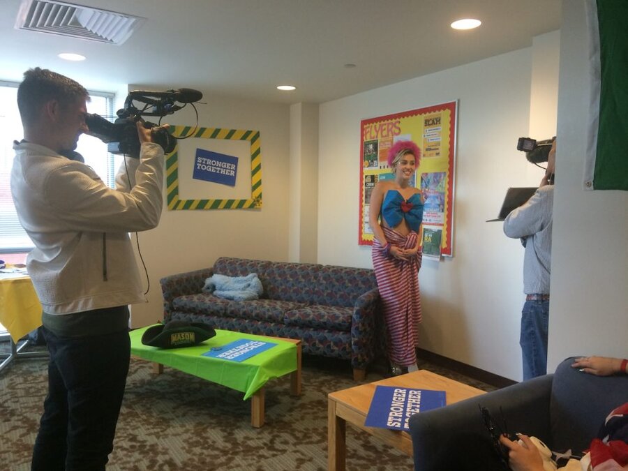 James Kicklighter Shoots Interior Scene with Miley Cyrus capture a scene at George Mason University while boom operator holds microphone overhead during production shoot