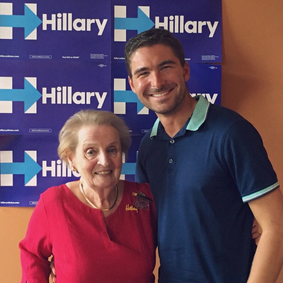 Director James Kicklighter and Former United States Secretary of State Madeleine Albright in front of Hillary Clinton campaign backdrop in Virginia