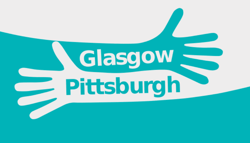 Illustration of two extended arms in teal, reaching out toward each other with "Glasgow" and "Pittsburgh" written between them, against a white and teal background.