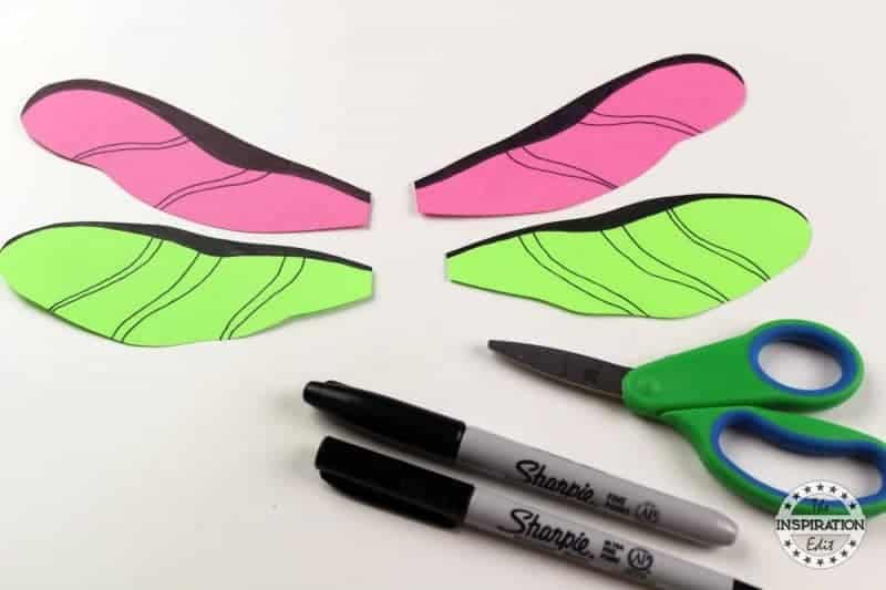 Black Markers, Scissors, and Wings.