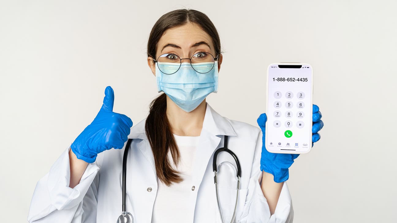Nurse with glove doing a thumbs up with the number for Pre-Authorization of Medical Treatment for At-Work Injuries