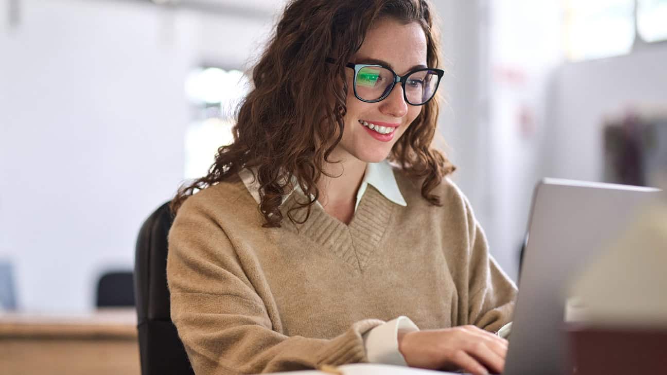 A woman working on her laptop