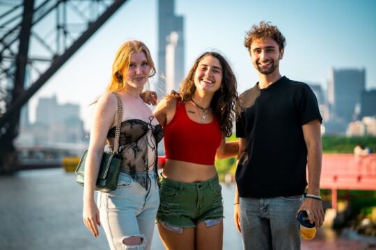 A split-screen image of a couple laughing, one side showing an urban skyline with neon lights and the other a rural starry field, highlighting diverse dating vibes.