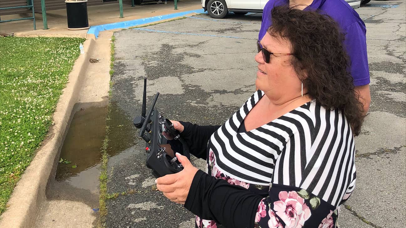 Choctaw Tribal Councilwomen Jennifer Woods flying a drone