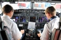 Pilots in the cockpit during a commertial flight | get out of debt guy - steve rhode Pilots in the cockpit during a commertial flight