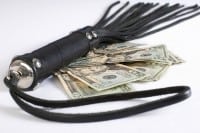 Black leather flogging whip and money on white background. Not i