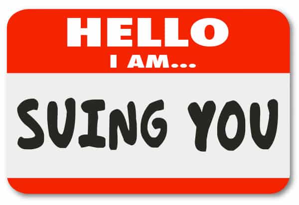 Hello i am suing you words on a name tag sticker informing that someone is bringing a lawsuit against you in a court of law