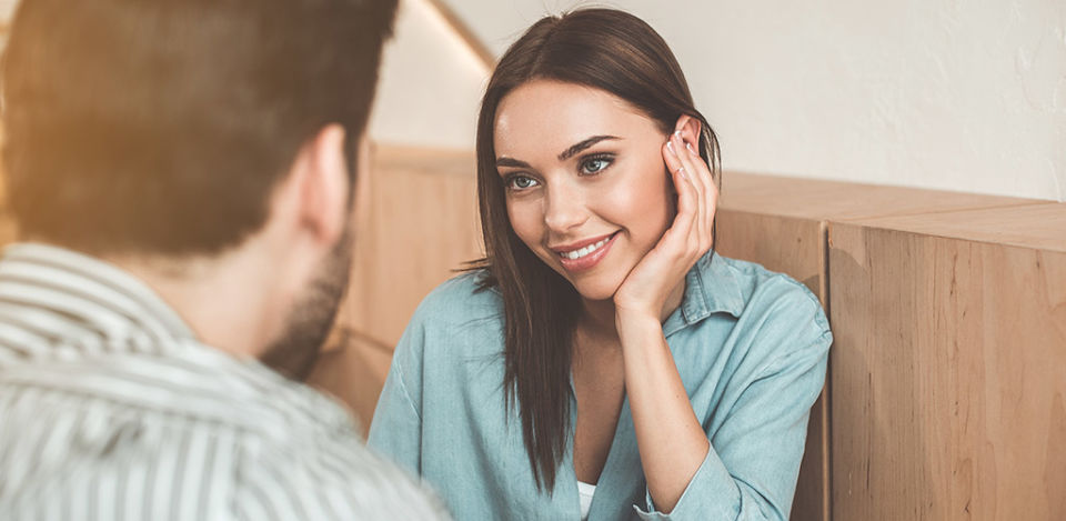 Woman with a man who knows how to build sexual tension even if they've just met