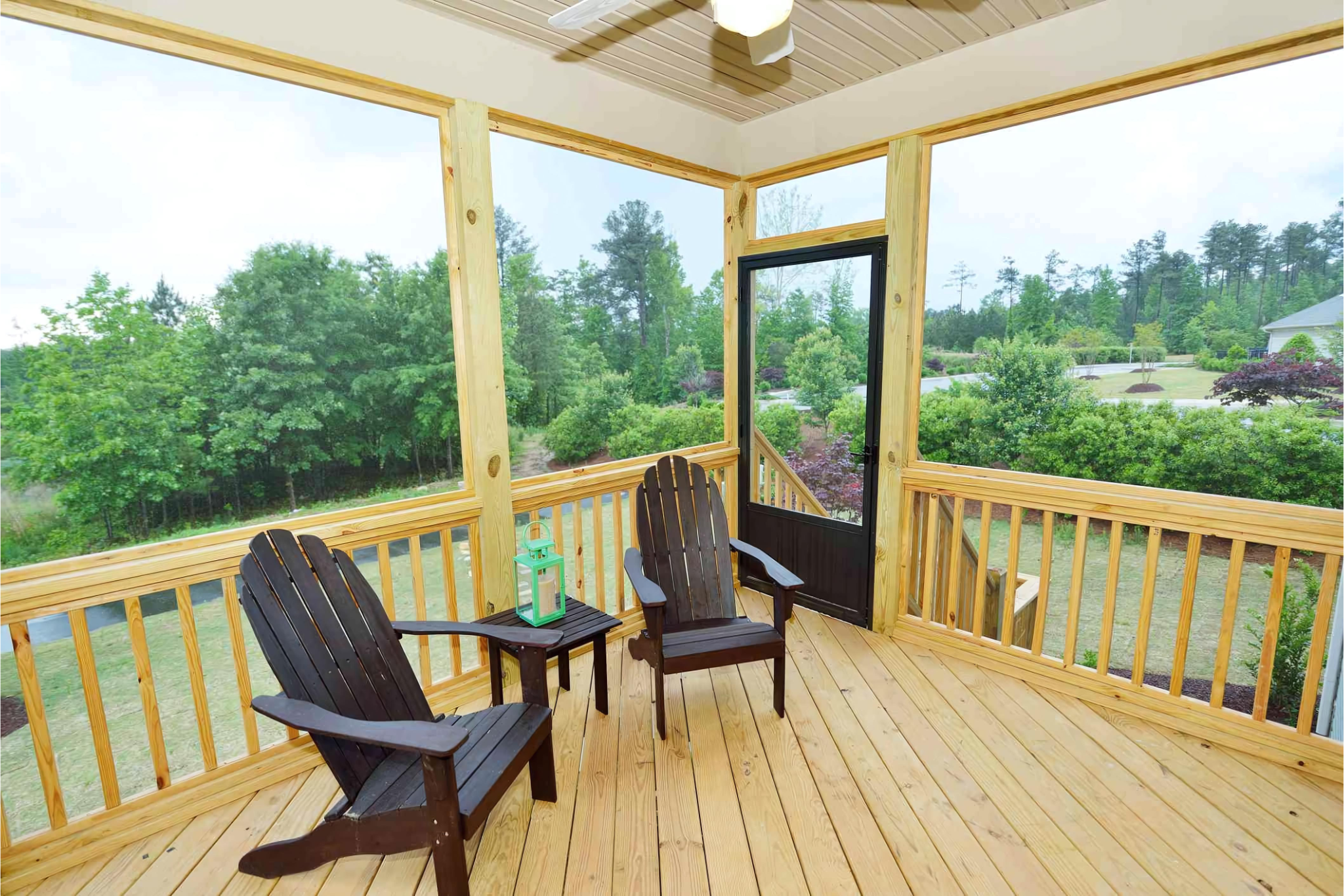 This pine desk has been enclosed with a custom screen room and composite roof. 