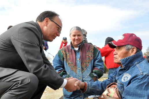 Gary Batton shakes a man's hand