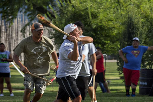 Gary Batton plays stickball