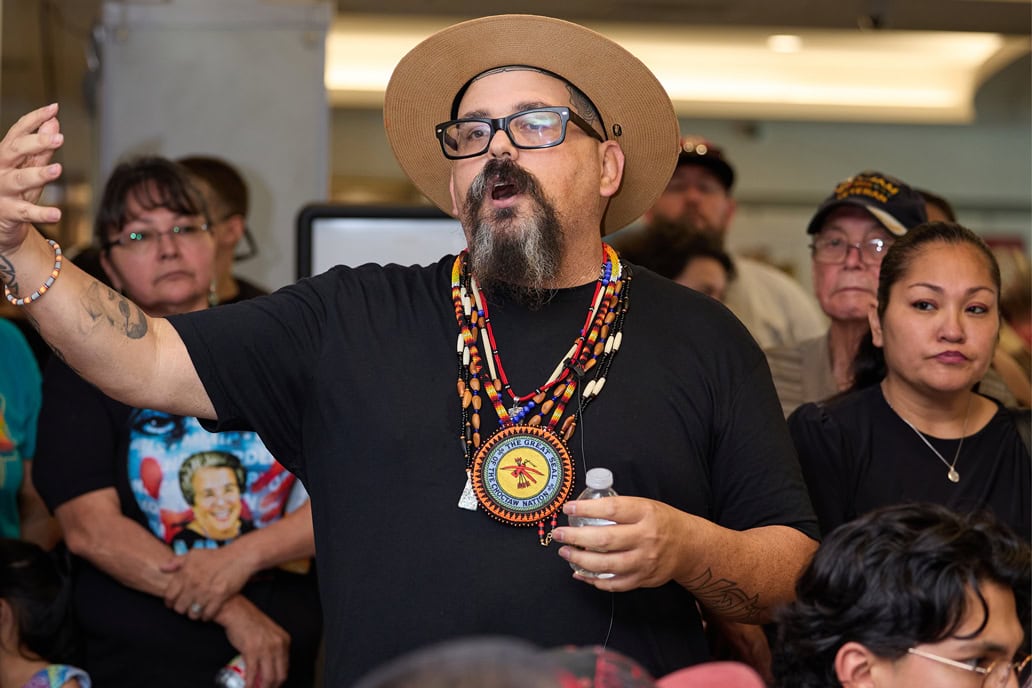 Bobby Von Martin speaks in front of a group of people