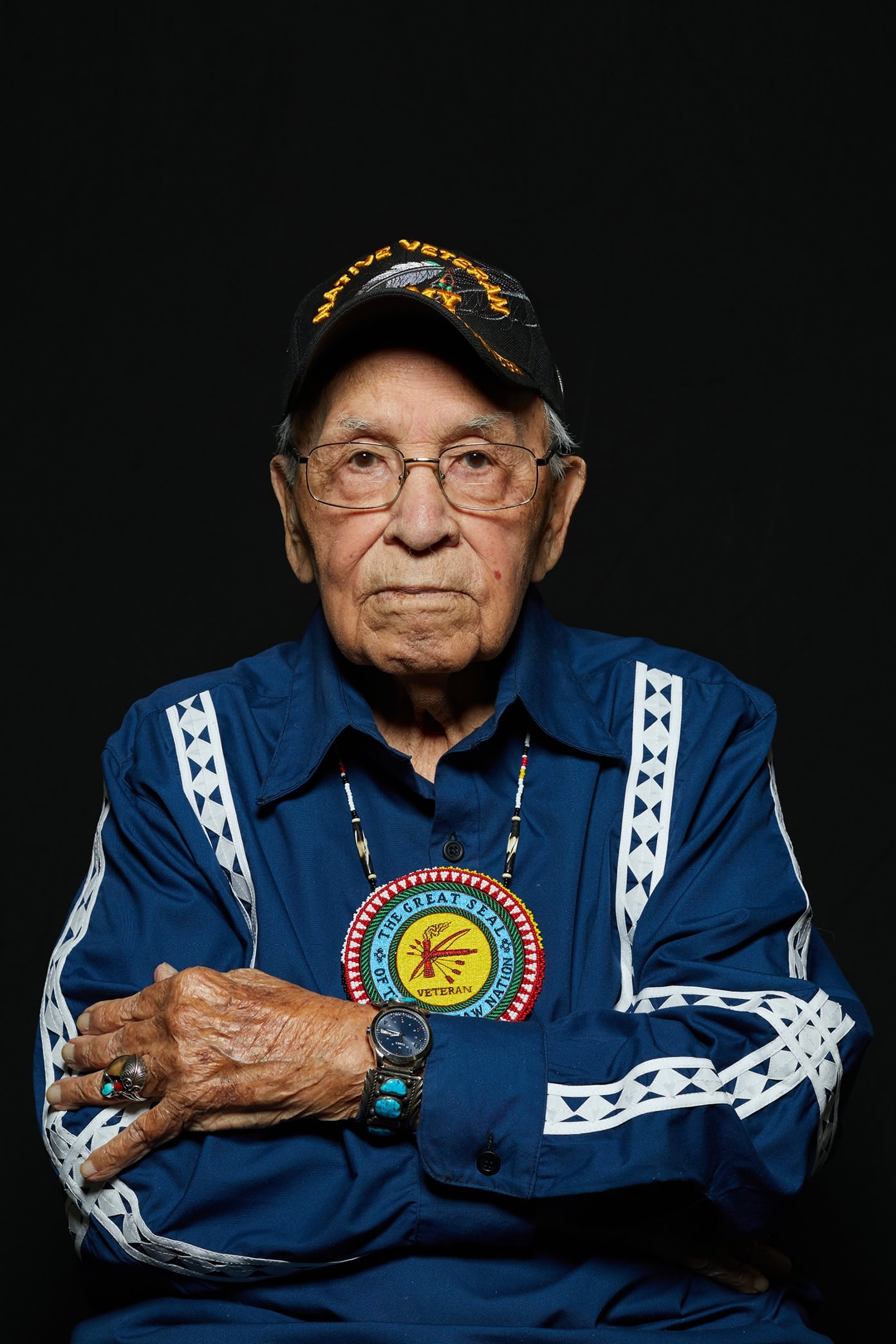 Portrait of Choc wearing official attire of the Choctaw Nation while wearing his hat