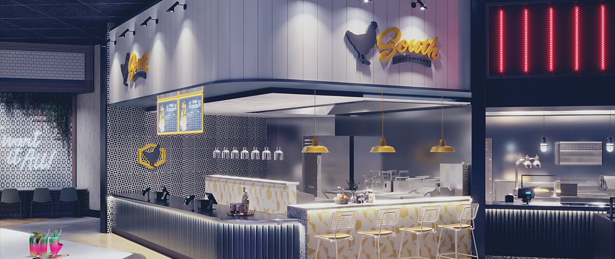 South Hot Chicken counter with yellow signage and pendants, white paneling, patterned front, and counter stools.