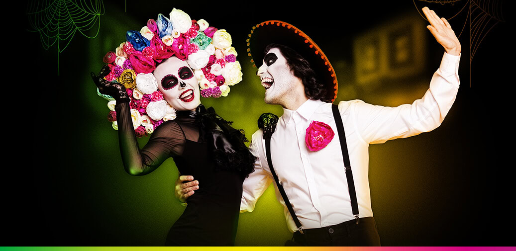 People dressed as sugar skulls