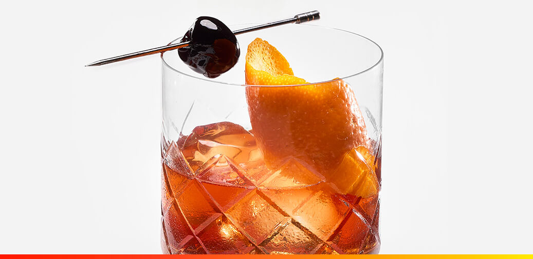 Cocktail with an orange peel
