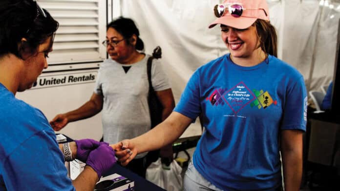 A person in the Healthy Living Tent