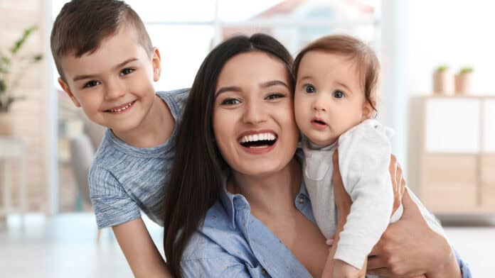 Mother with her two young children