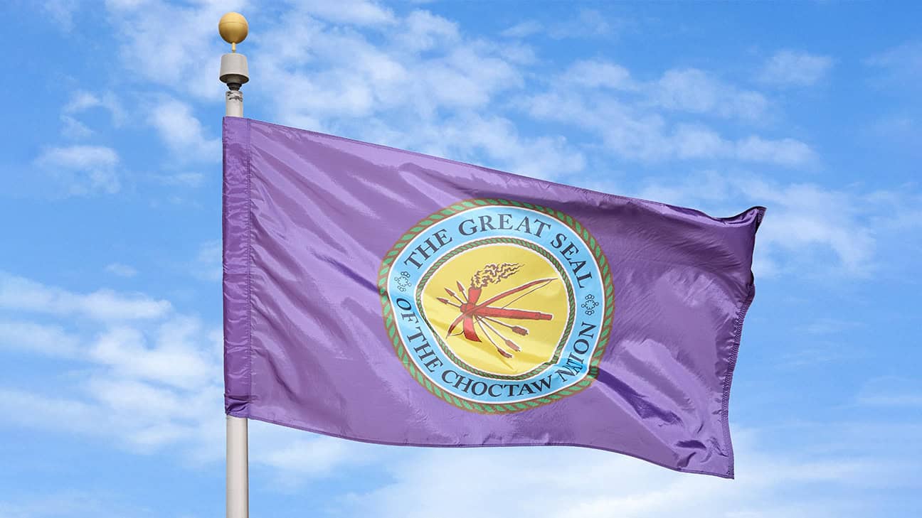 Choctaw flag against a blue sky