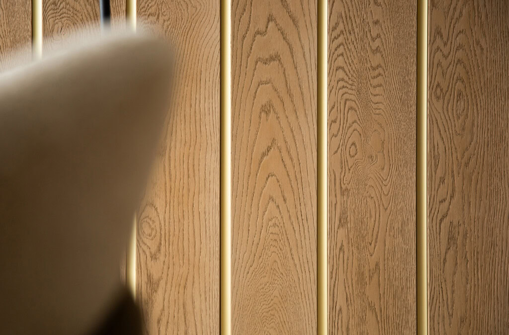Millboard Shadow Line cladding in Golden Oak