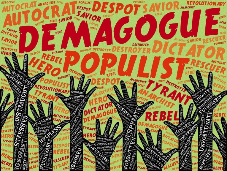 Donald trump is a fascist. Sign showing hands raised to a yellow sky full of words like “tyranny” and “demagogue”