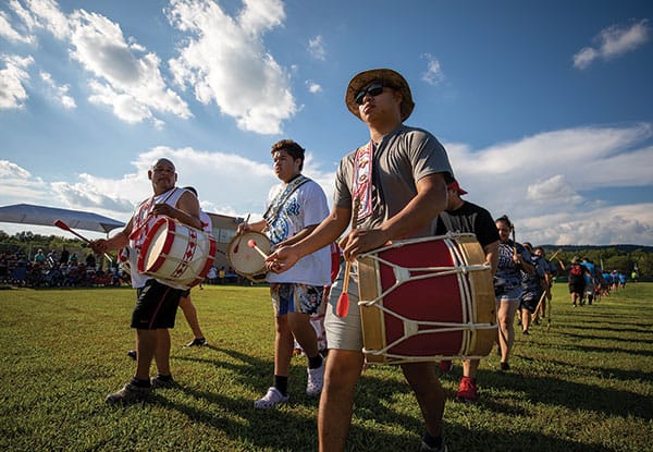 Drummers lead players onto the field