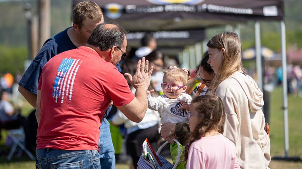 Gary Batton gives a high five.