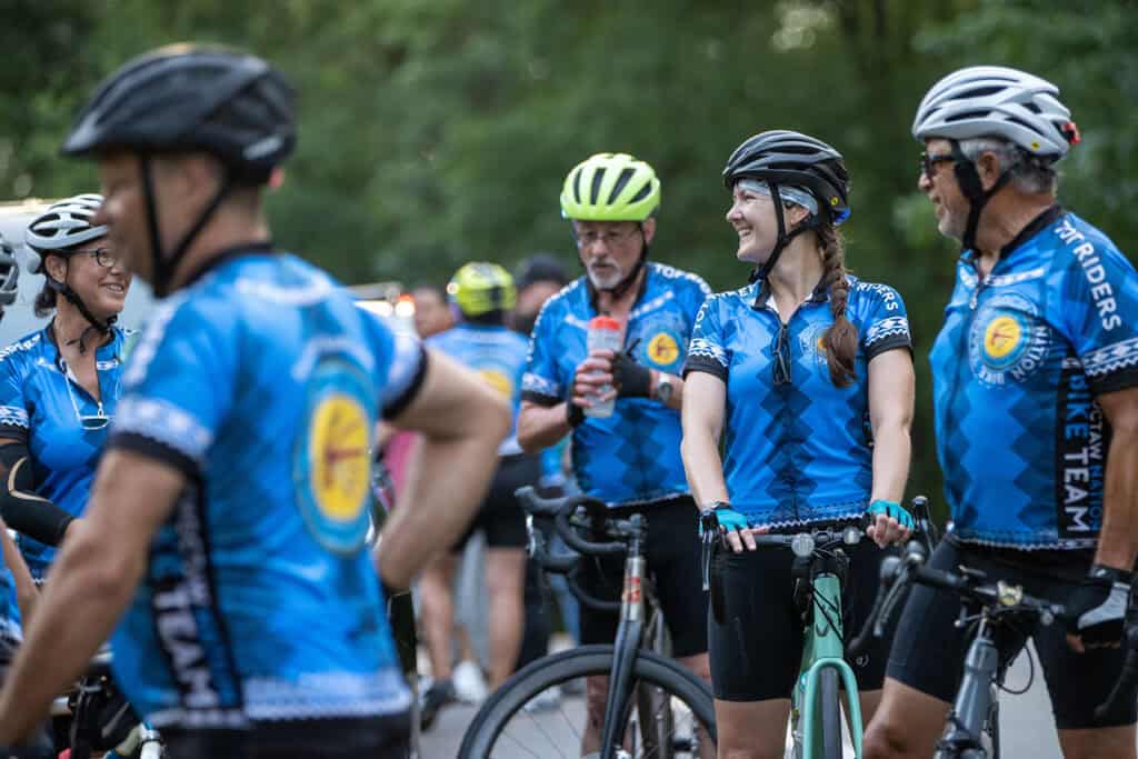 Cyclists enjoy a rest stop.