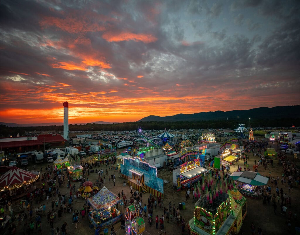 A view of the labor day festival grounds at sunset, from the top of the ferris wheel.