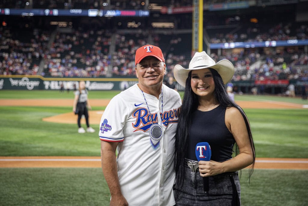A man and a women pose for the camera.