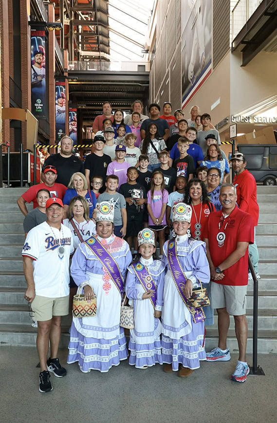 A large group of people pose for a photo.
