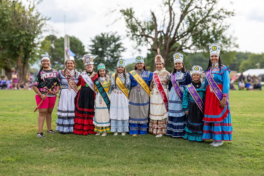 Native royalty pose for a photo.