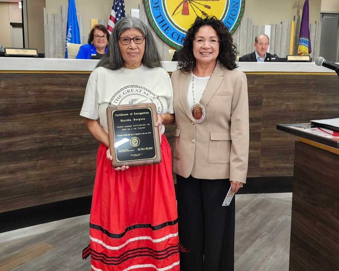 Marsha Burgess poses for a photo with Councilmember Regina Mabray.