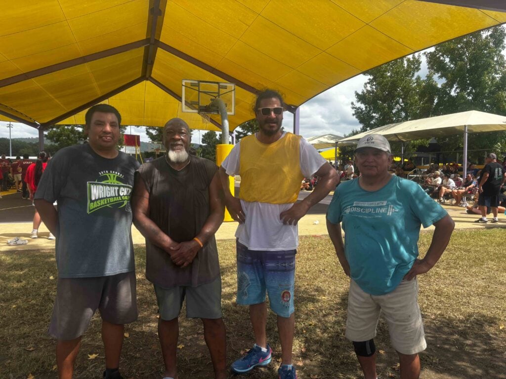 A group of people pose for a photo.