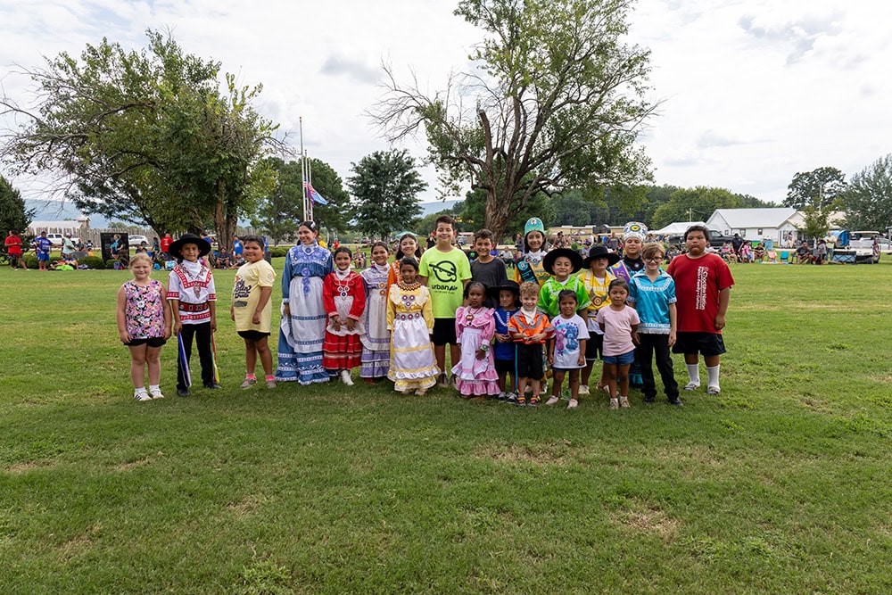 A large group of people pose for a photo.