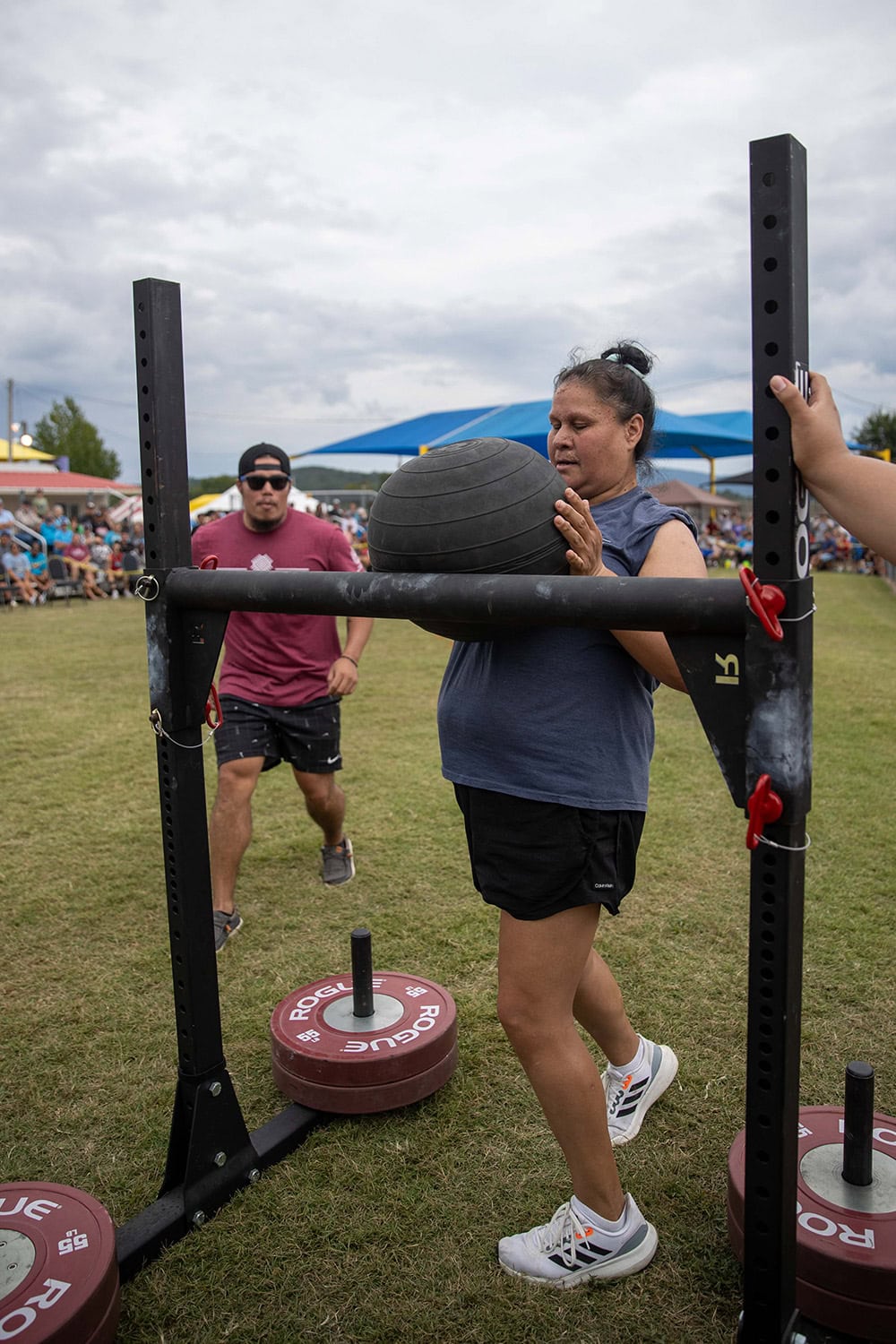 Contestants compete in the tough tough competition.