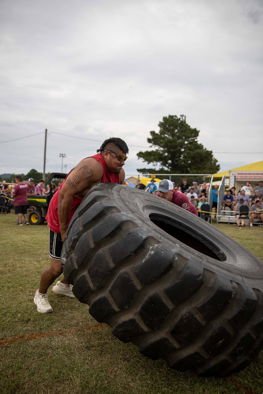 Contestants compete in the tough tough competition.