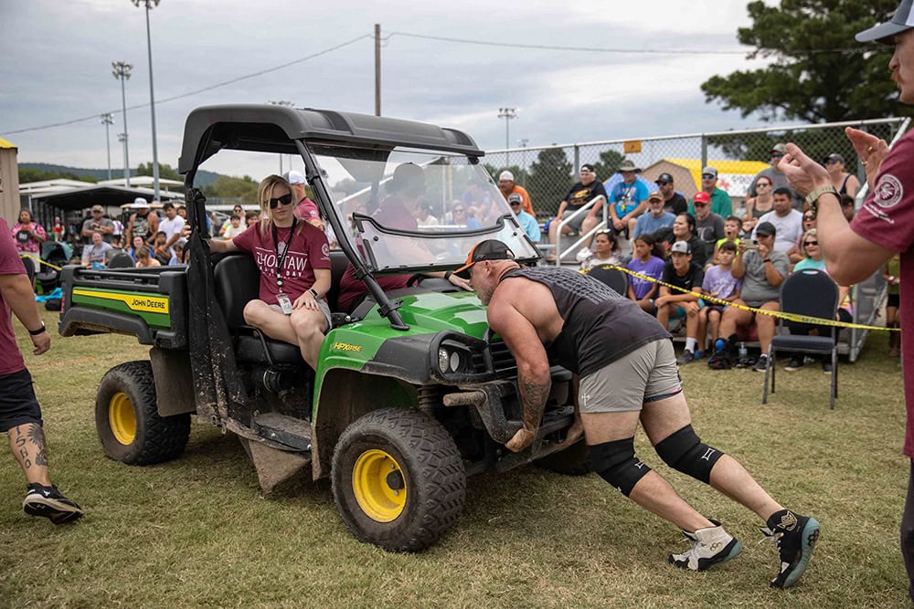 Contestants compete in the tough tough competition.