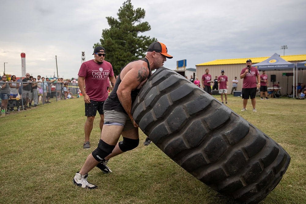 Contestants compete in the tough tough competition.