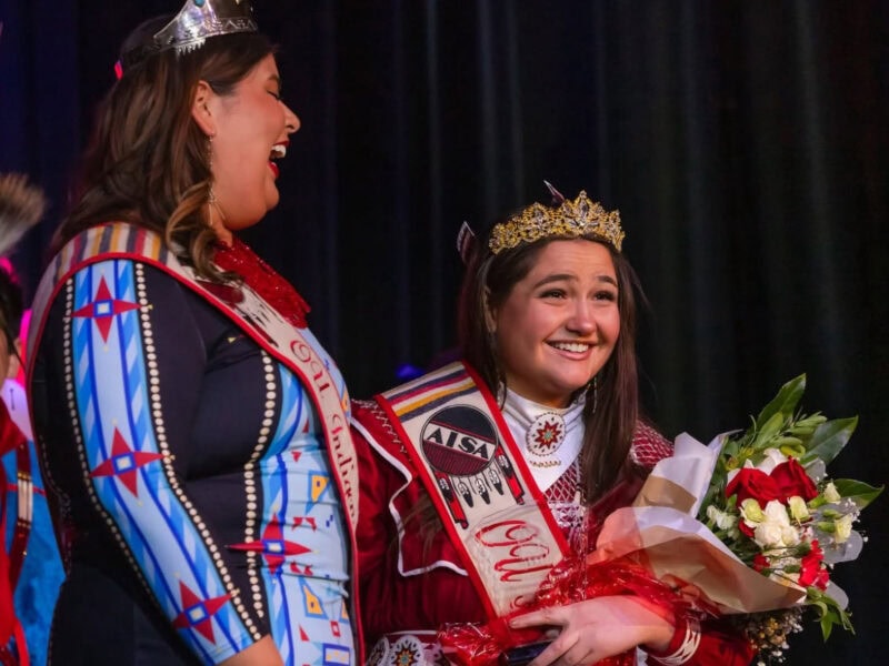 Pageant contestants react to the winning announcement.
