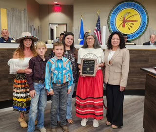 A family poses for a photo.